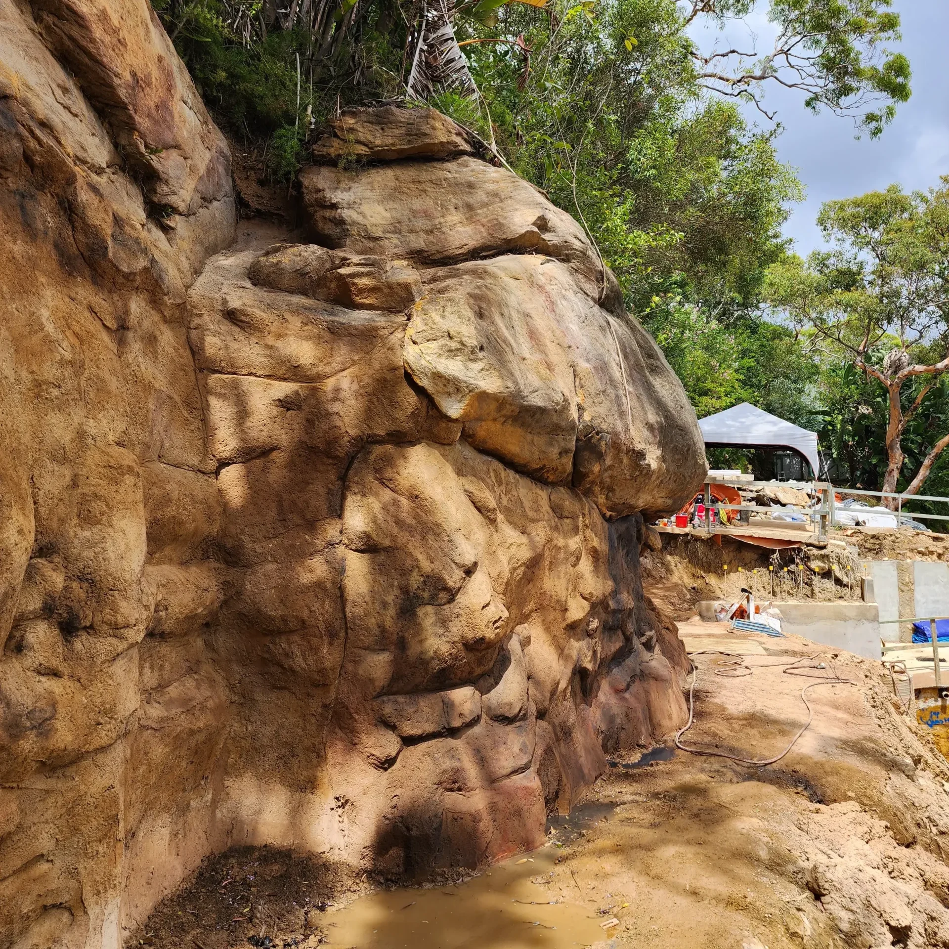 Mock Rock Cliff Beside Worksite