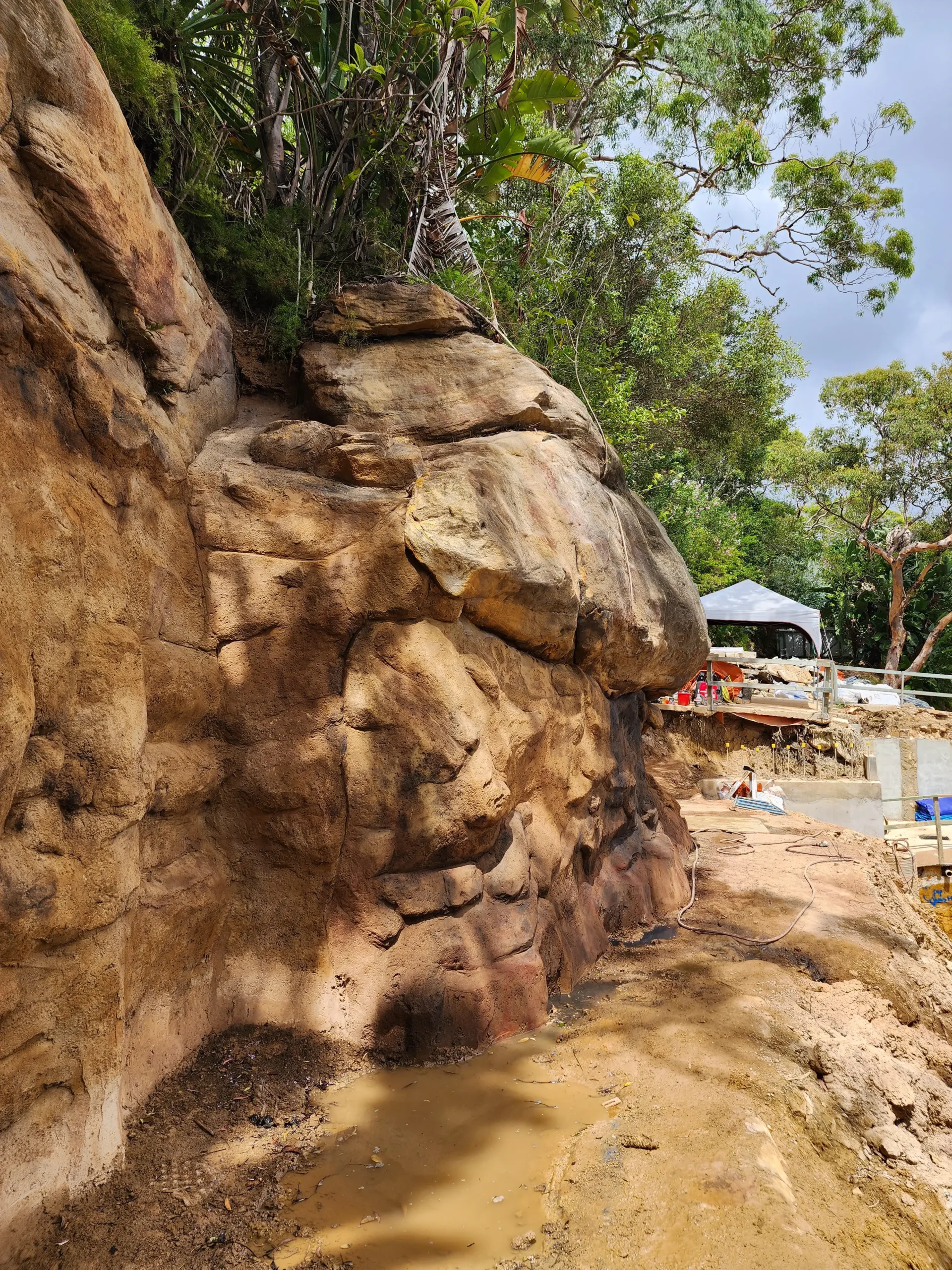 Mock Rock Cliff Beside Worksite
