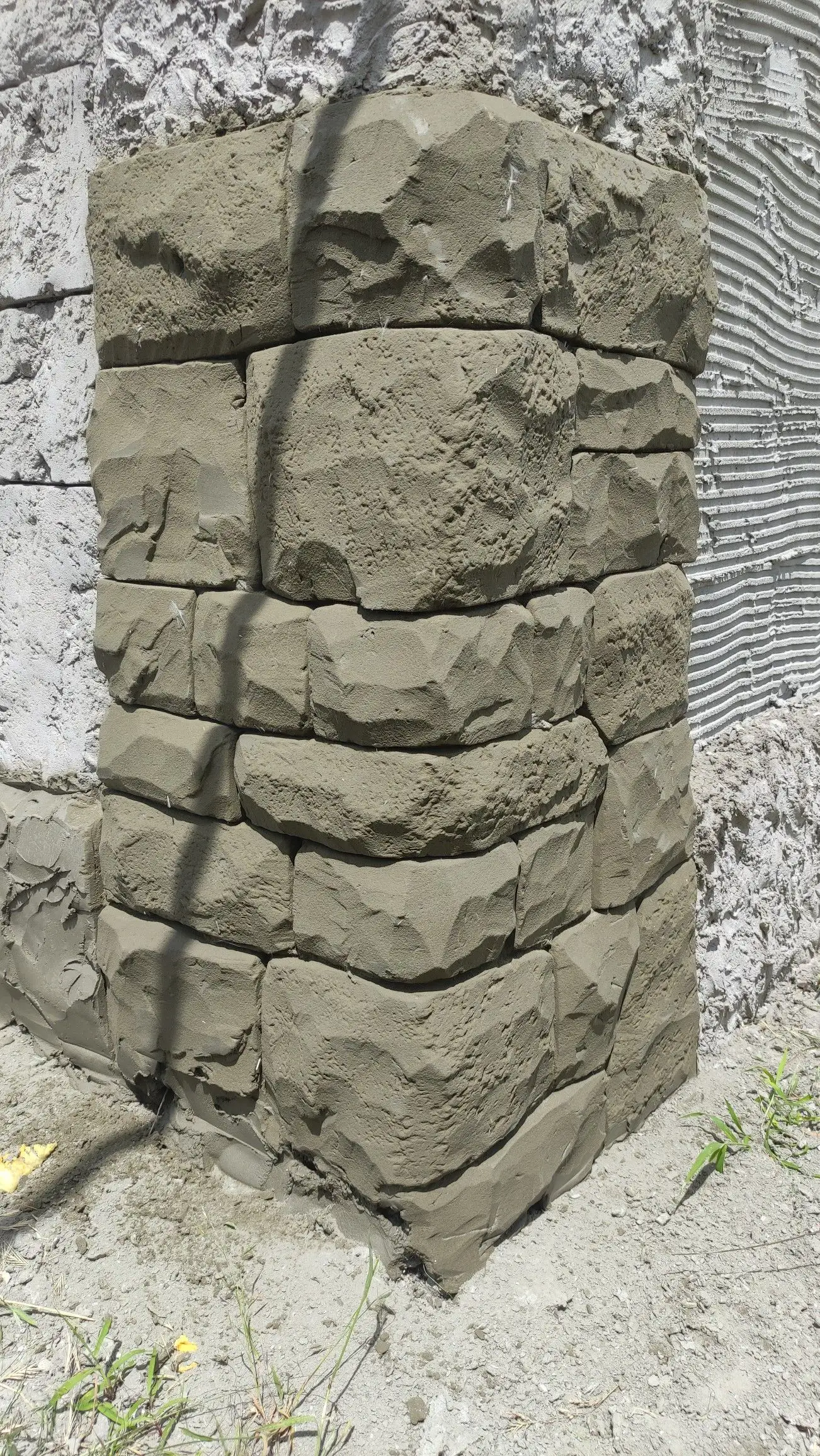Mock Stone Pillar Under Construction